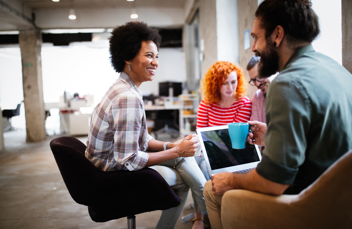 Business People Chatting At Workplace