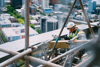 A Construction Worker Up Scaffolding
