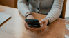 A Person Using A Mobile Phone